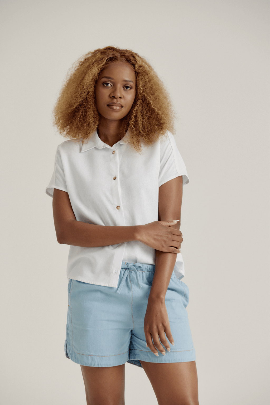 CURVED HEM CHAMBRAY SHORTS