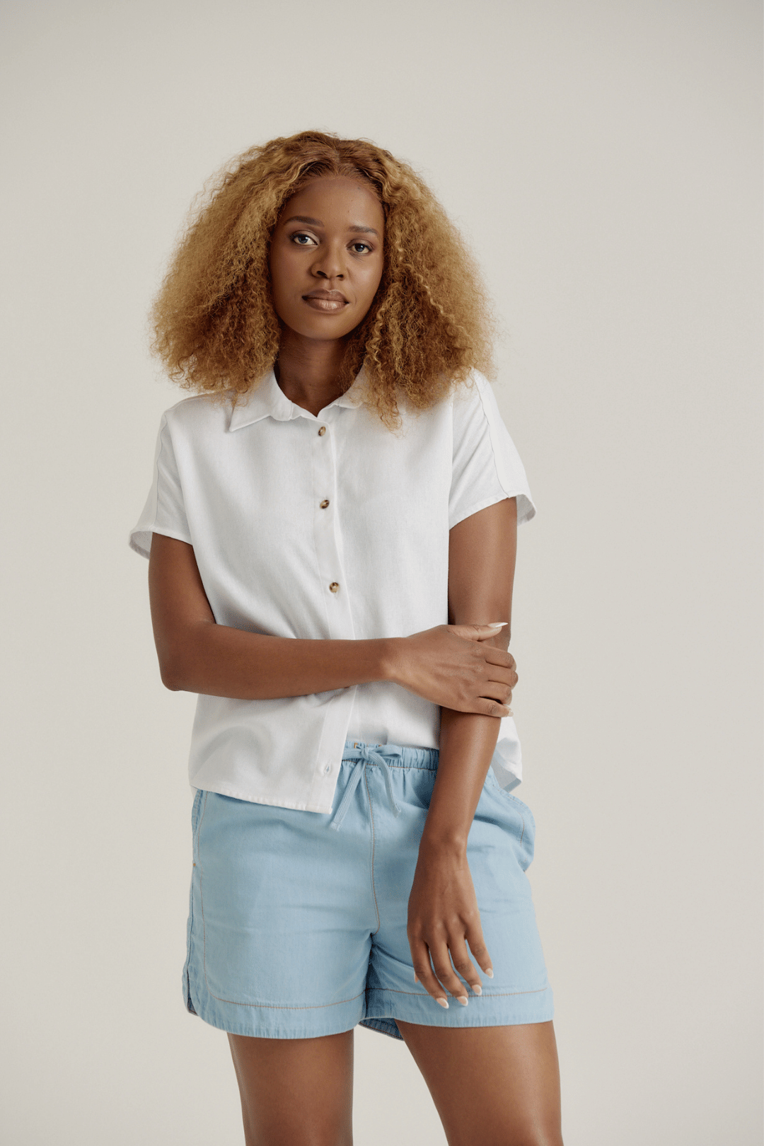 CURVED HEM CHAMBRAY SHORTS