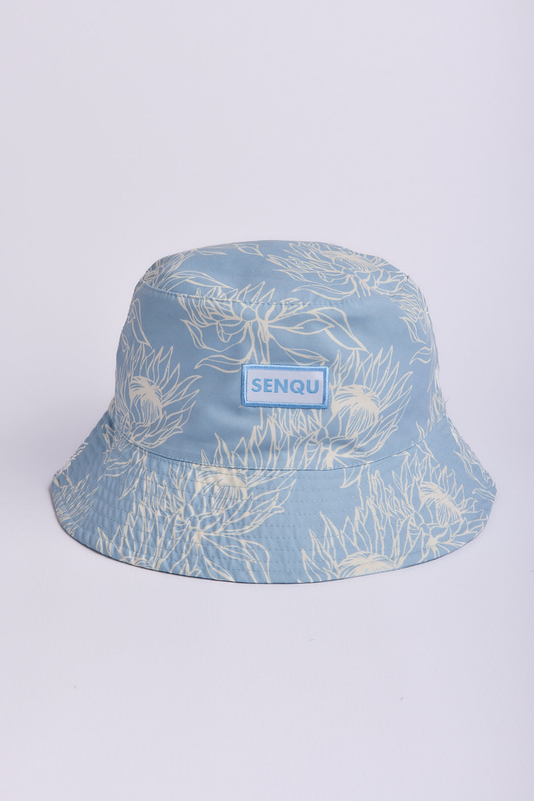 PROTEA REVERSABLE BUCKET HAT
